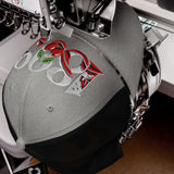 Bournemouth 1899 Heritage Cherries embroidered football trucker cap, heather black colour, front view