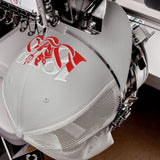 Manchester United 1878 Red Devil Heritage embroidered football trucker cap, silver colour, front view