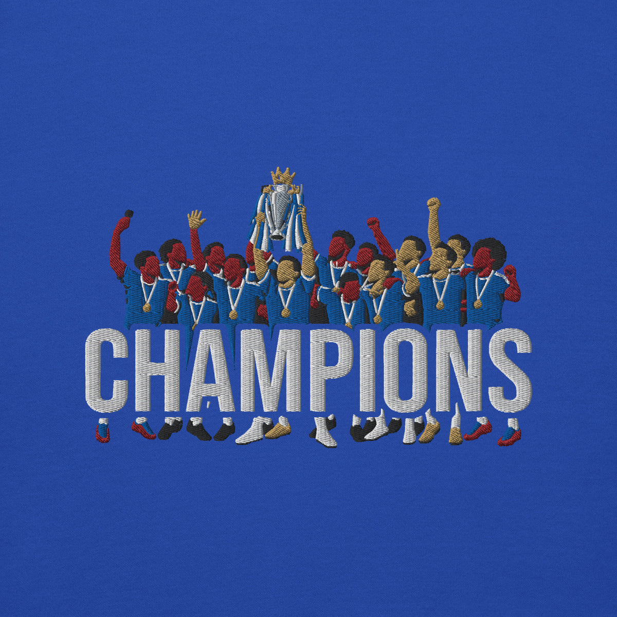 Embroidery close-up of Chelsea-inspired team royal hoodie with trophy-lift embroidery and CHAMPIONS lettering