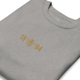 Manchester City Bee Embroidered Football Sweatshirt in carbon grey, close-up of design