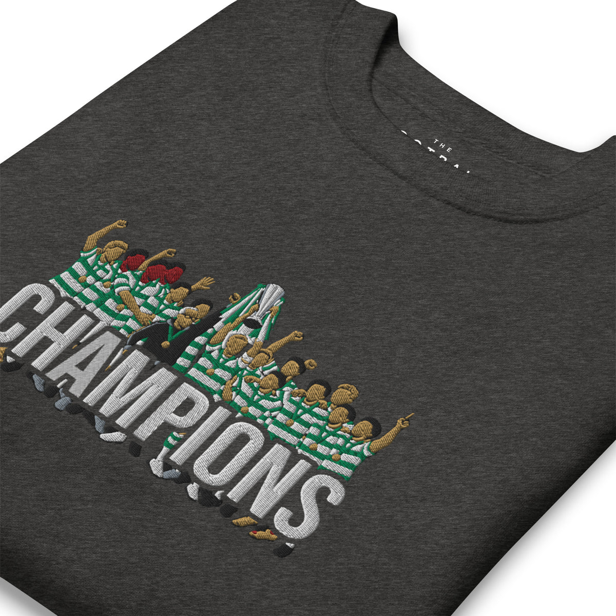 Celtic-inspired charcoal heather sweatshirt with trophy-lift embroidery and CHAMPIONS lettering