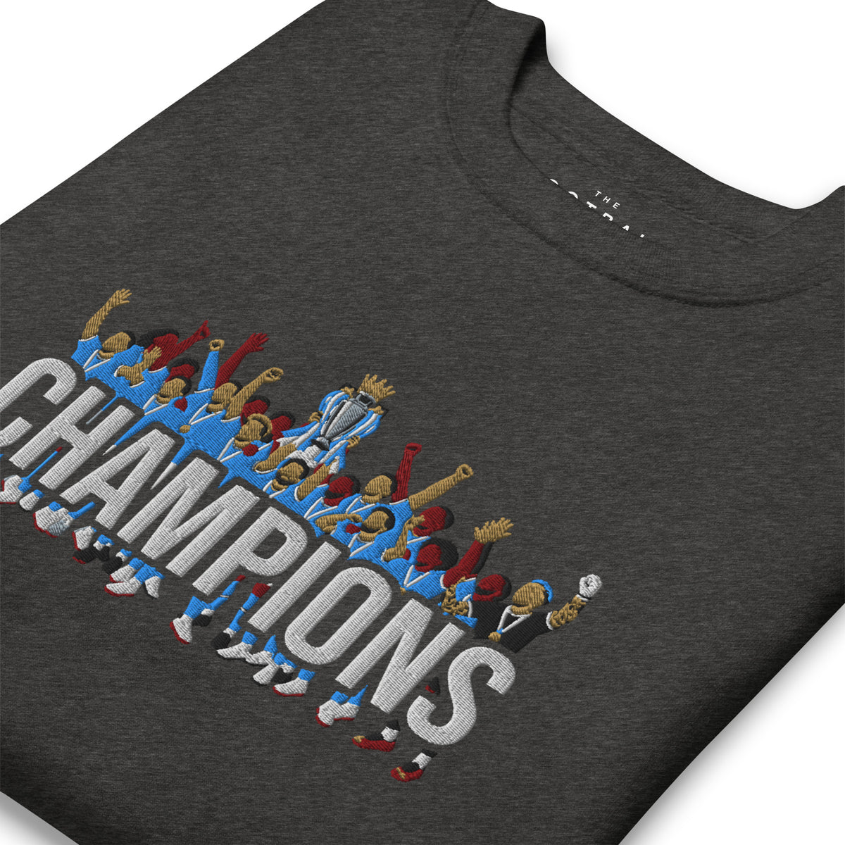 Manchester City-inspired charcoal heather sweatshirt with trophy-lift embroidery and CHAMPIONS lettering