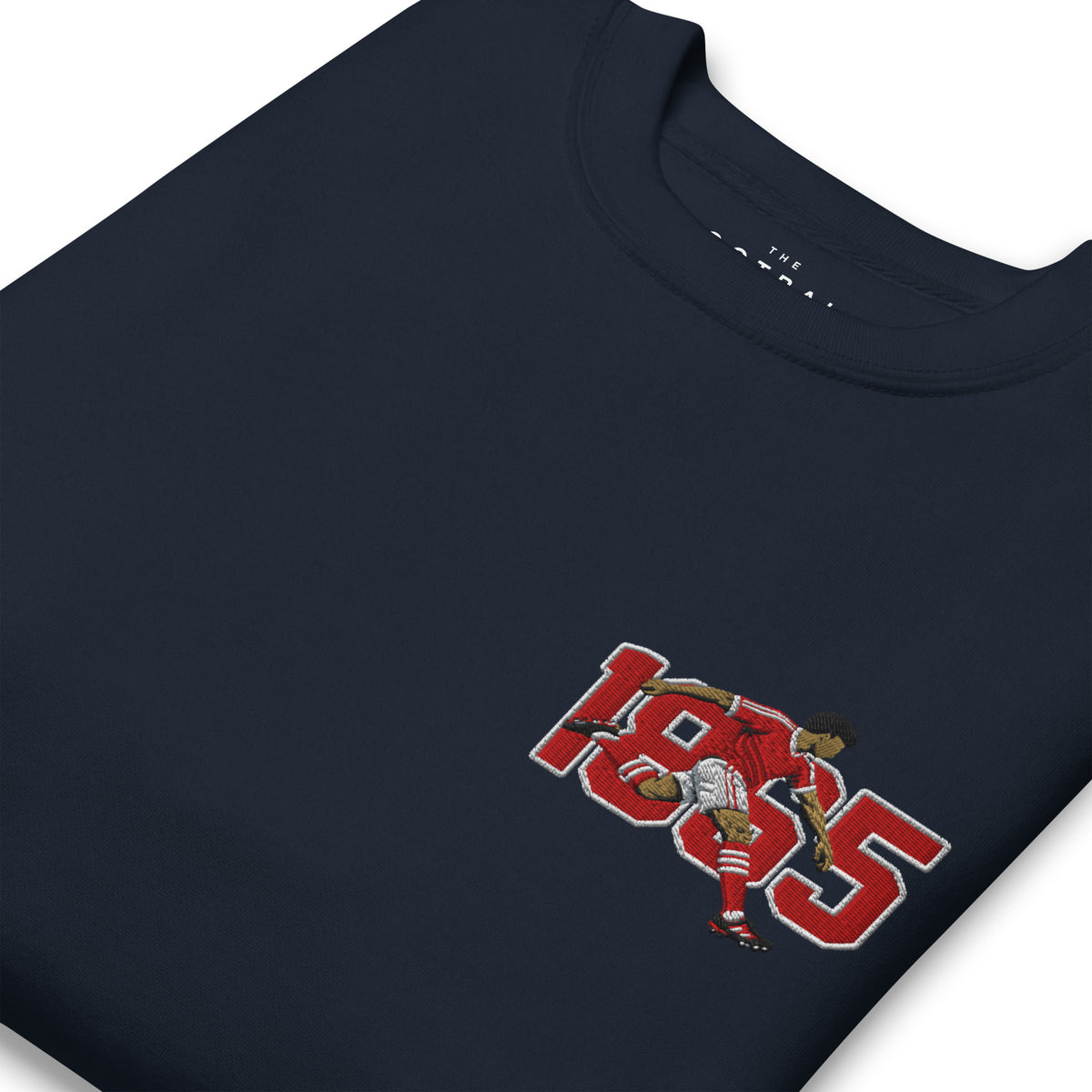 Close-up of Nottingham 1865 retro embroidery on navy blazer sweatshirt