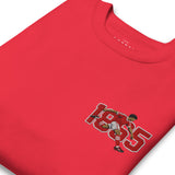 Close-up of Nottingham 1865 retro embroidery on team red sweatshirt