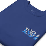 Close-up of Manchester 1894 Worker Bee embroidery on team royal sweatshirt